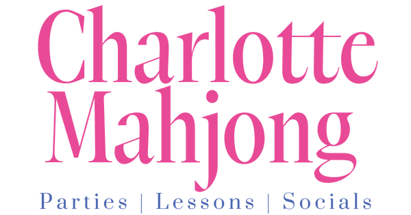 Charlotte Mahjong logo with pink text on a white background