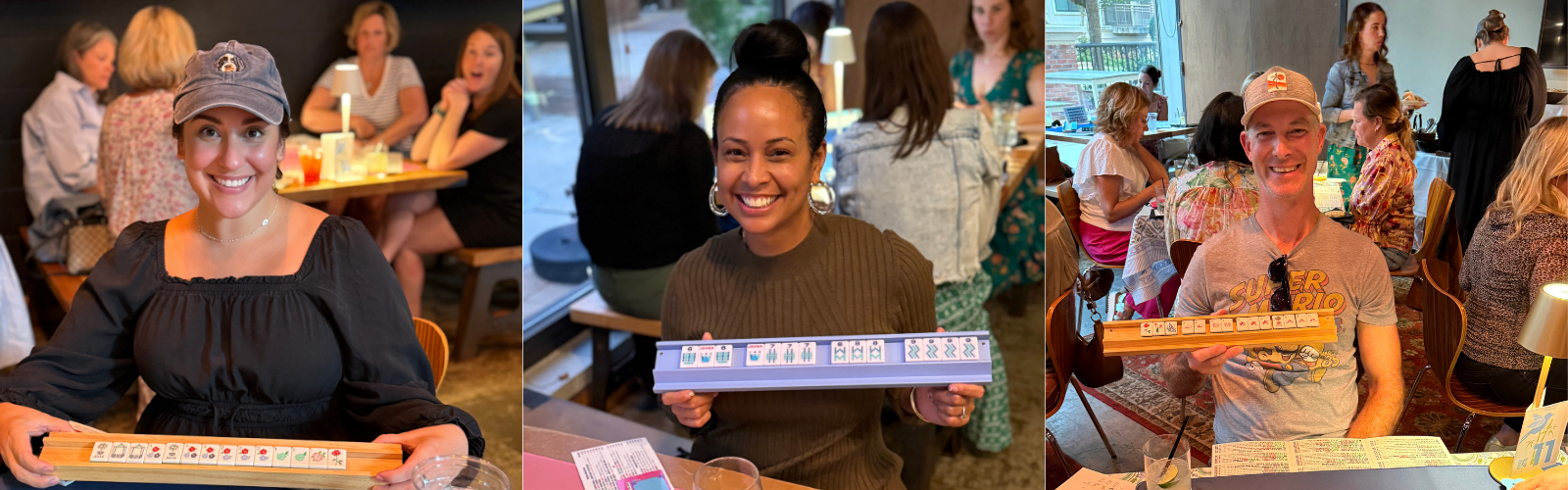 Three people holding pizza boxes in a casual setting with other people in the background.